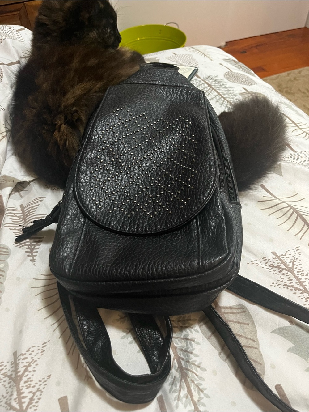 Black faux leather backpack style purse